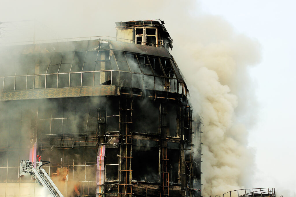 shopping center or mall fire,smoke,fighters,space for copy or te